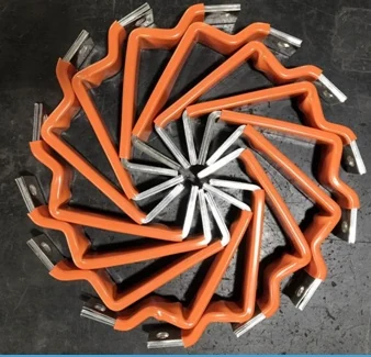 Insulated laminated busbars bent to shape with bare copper ends